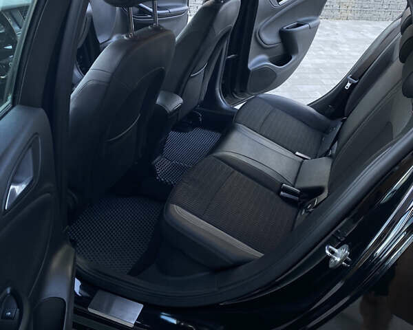 Черный Опель Астра, объемом двигателя 1.5 л и пробегом 170 тыс. км за 13500 $, фото 19 на Automoto.ua