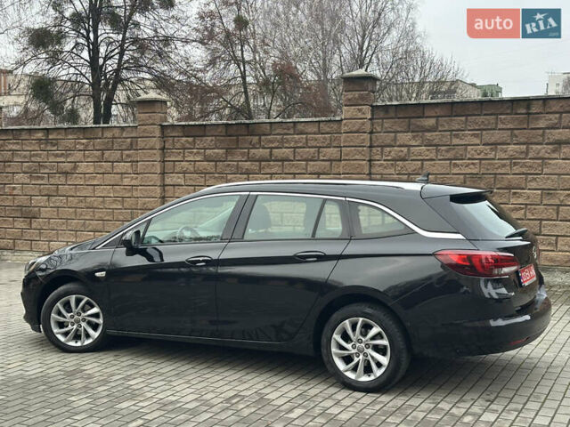 Черный Опель Астра, объемом двигателя 1.5 л и пробегом 260 тыс. км за 12800 $, фото 1 на Automoto.ua