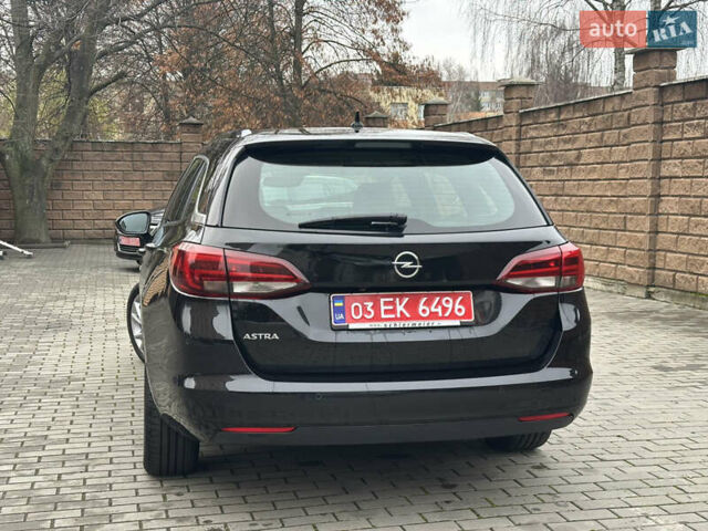 Черный Опель Астра, объемом двигателя 1.5 л и пробегом 260 тыс. км за 12800 $, фото 4 на Automoto.ua
