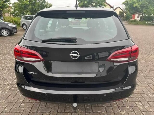Черный Опель Астра, объемом двигателя 1.5 л и пробегом 22 тыс. км за 11000 $, фото 4 на Automoto.ua