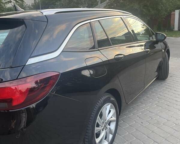 Черный Опель Астра, объемом двигателя 1.5 л и пробегом 218 тыс. км за 14100 $, фото 7 на Automoto.ua