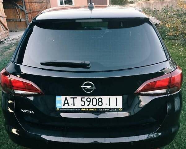 Черный Опель Астра, объемом двигателя 1.5 л и пробегом 172 тыс. км за 11800 $, фото 4 на Automoto.ua