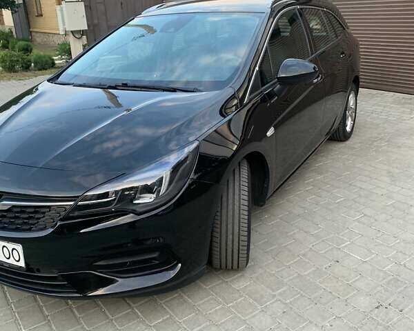 Черный Опель Астра, объемом двигателя 1.5 л и пробегом 218 тыс. км за 14100 $, фото 2 на Automoto.ua