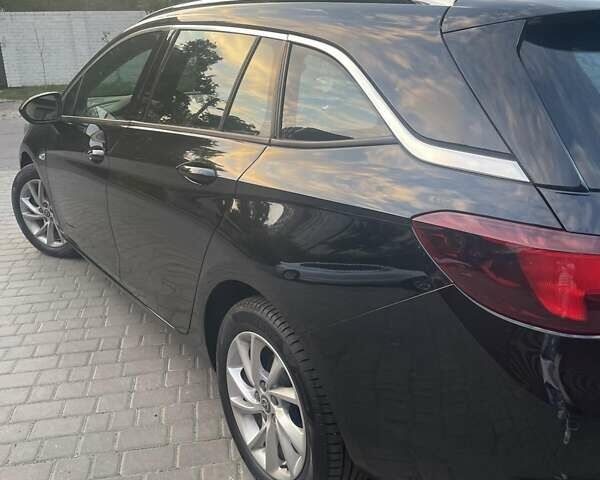 Черный Опель Астра, объемом двигателя 1.5 л и пробегом 218 тыс. км за 14100 $, фото 6 на Automoto.ua
