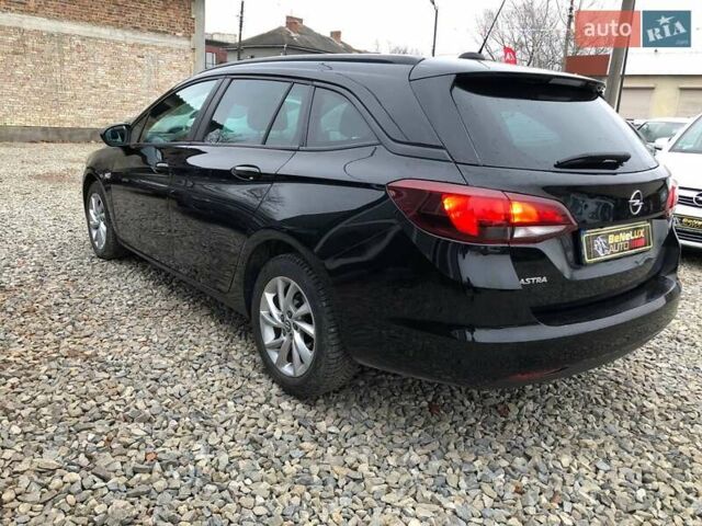 Черный Опель Астра, объемом двигателя 1.5 л и пробегом 172 тыс. км за 11499 $, фото 4 на Automoto.ua