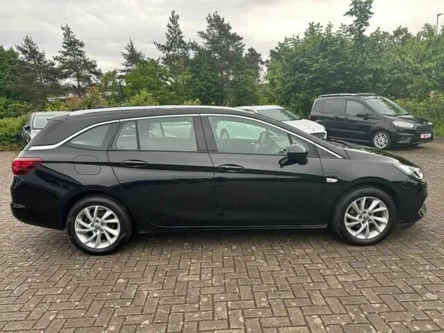 Черный Опель Астра, объемом двигателя 1.5 л и пробегом 22 тыс. км за 11000 $, фото 5 на Automoto.ua