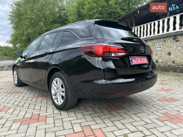 Черный Опель Астра, объемом двигателя 1.5 л и пробегом 125 тыс. км за 13700 $, фото 13 на Automoto.ua