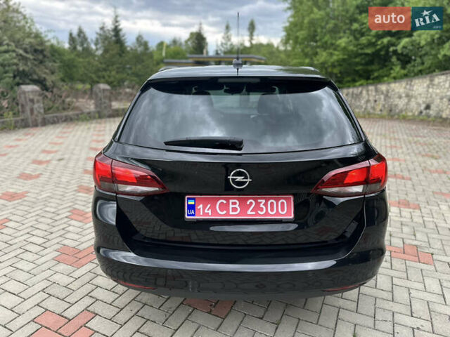 Черный Опель Астра, объемом двигателя 1.5 л и пробегом 125 тыс. км за 13700 $, фото 11 на Automoto.ua