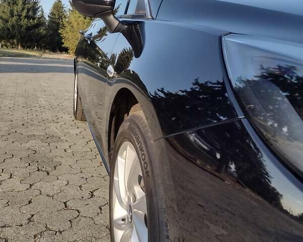 Черный Опель Астра, объемом двигателя 1.5 л и пробегом 120 тыс. км за 13500 $, фото 7 на Automoto.ua