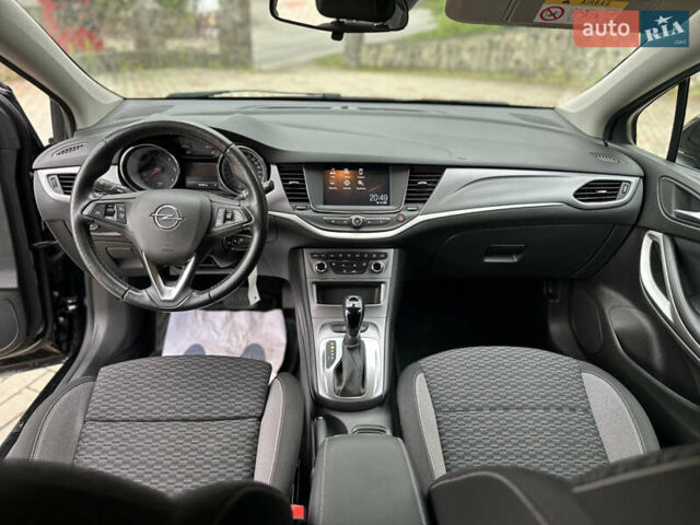 Черный Опель Астра, объемом двигателя 1.5 л и пробегом 125 тыс. км за 13700 $, фото 18 на Automoto.ua