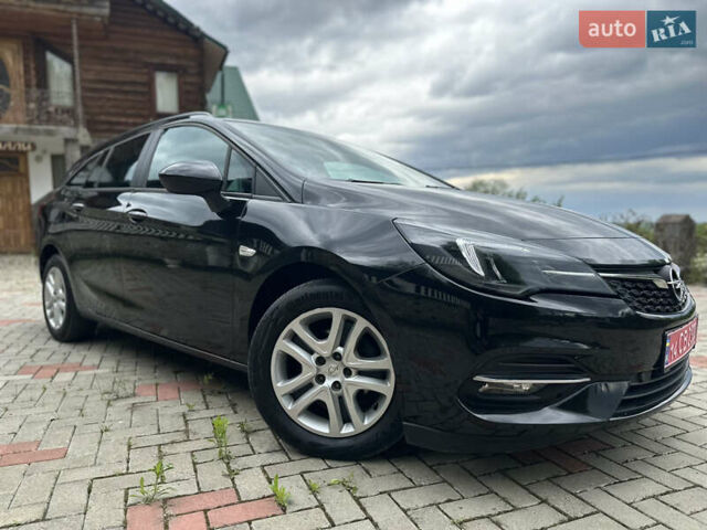 Черный Опель Астра, объемом двигателя 1.5 л и пробегом 125 тыс. км за 13700 $, фото 29 на Automoto.ua