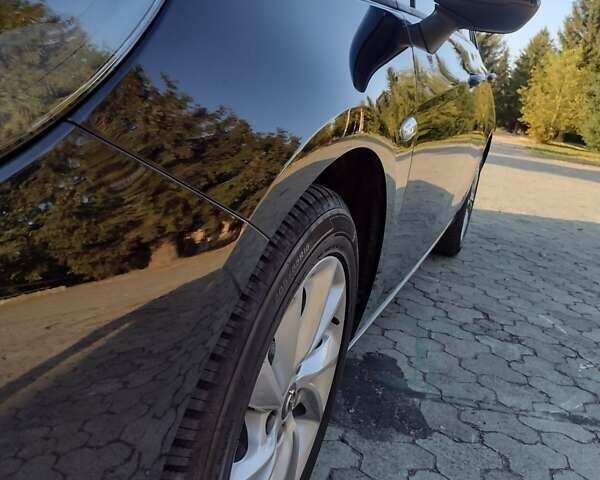 Черный Опель Астра, объемом двигателя 1.5 л и пробегом 120 тыс. км за 13500 $, фото 1 на Automoto.ua