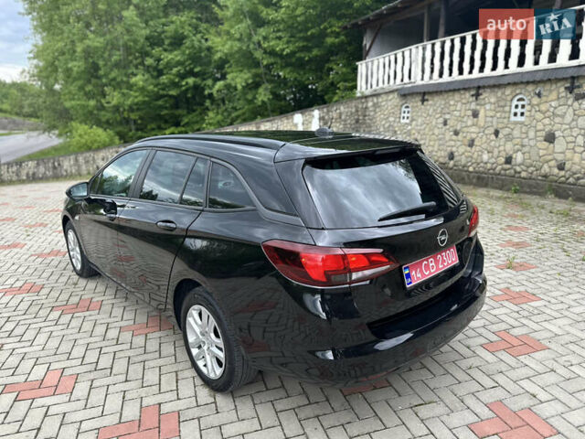 Черный Опель Астра, объемом двигателя 1.5 л и пробегом 125 тыс. км за 13700 $, фото 12 на Automoto.ua