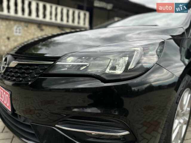 Черный Опель Астра, объемом двигателя 1.5 л и пробегом 125 тыс. км за 13700 $, фото 27 на Automoto.ua