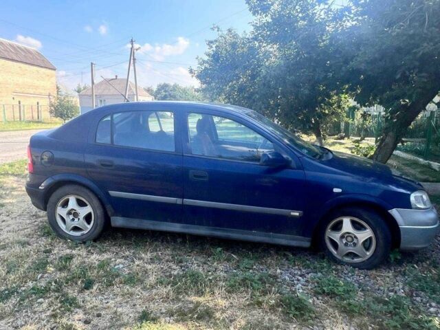 Фіолетовий Опель Астра, об'ємом двигуна 2 л та пробігом 280 тис. км за 29235 $, фото 5 на Automoto.ua