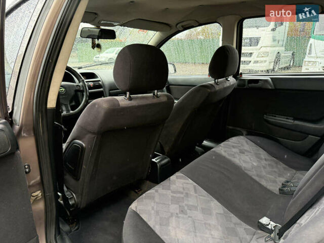 Коричневый Опель Астра, объемом двигателя 2 л и пробегом 240 тыс. км за 2500 $, фото 6 на Automoto.ua