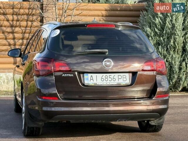 Коричневый Опель Астра, объемом двигателя 1.6 л и пробегом 165 тыс. км за 7698 $, фото 23 на Automoto.ua