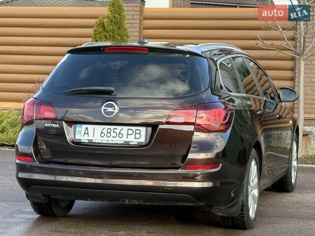 Коричневый Опель Астра, объемом двигателя 1.6 л и пробегом 165 тыс. км за 7698 $, фото 26 на Automoto.ua