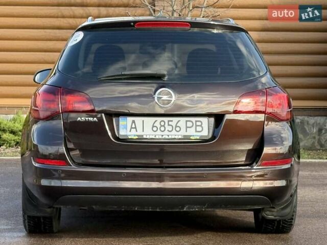 Коричневый Опель Астра, объемом двигателя 1.6 л и пробегом 165 тыс. км за 7698 $, фото 24 на Automoto.ua