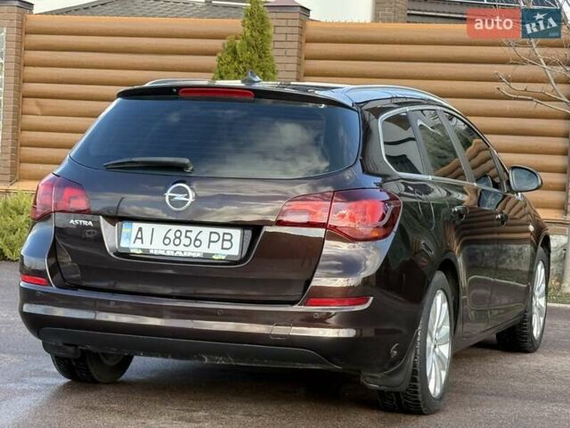 Коричневый Опель Астра, объемом двигателя 1.6 л и пробегом 165 тыс. км за 7698 $, фото 27 на Automoto.ua