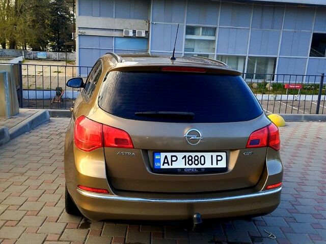 Опель Астра 2013 в Запорожье на Automoto.ua Коричневый Опель Астра, объемом двигателя 1.7 л и пробегом 205 тыс. км за 9000 $, фото 2 на Automoto.ua