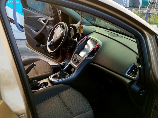 Опель Астра 2013 в Запорожье на Automoto.ua Коричневый Опель Астра, объемом двигателя 1.7 л и пробегом 205 тыс. км за 9000 $, фото 4 на Automoto.ua