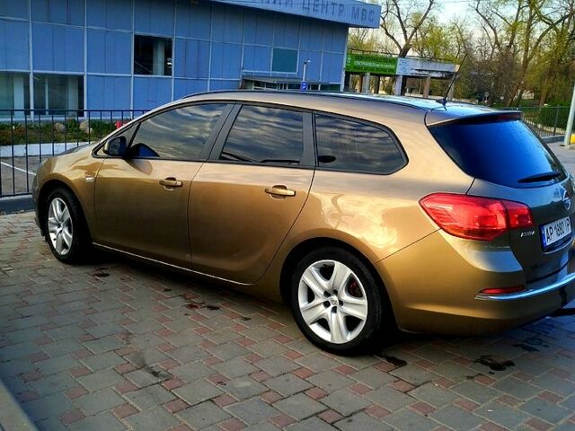 Опель Астра 2013 в Запорожье на Automoto.ua Коричневый Опель Астра, объемом двигателя 1.7 л и пробегом 205 тыс. км за 9000 $, фото 5 на Automoto.ua