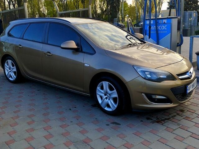 Опель Астра 2013 в Запорожье на Automoto.ua Коричневый Опель Астра, объемом двигателя 1.7 л и пробегом 205 тыс. км за 9000 $, фото 3 на Automoto.ua