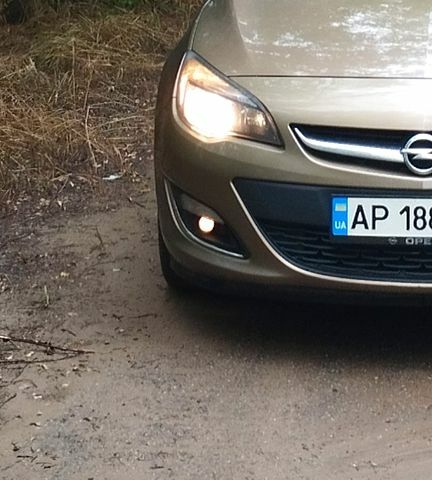 Опель Астра 2013 в Запорожье на Automoto.ua Коричневый Опель Астра, объемом двигателя 1.7 л и пробегом 205 тыс. км за 9000 $, фото 12 на Automoto.ua