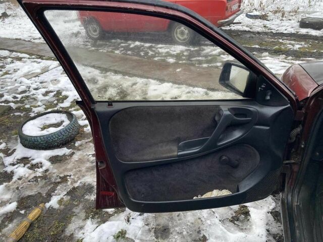 Красный Опель Астра, объемом двигателя 1.6 л и пробегом 256 тыс. км за 1200 $, фото 3 на Automoto.ua