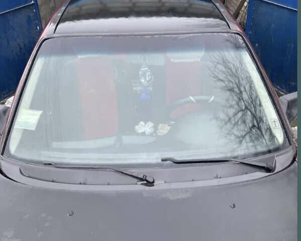 Красный Опель Астра, объемом двигателя 1.6 л и пробегом 265 тыс. км за 1200 $, фото 4 на Automoto.ua