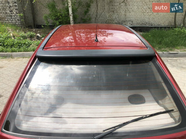 Красный Опель Астра, объемом двигателя 1.6 л и пробегом 332 тыс. км за 2100 $, фото 18 на Automoto.ua