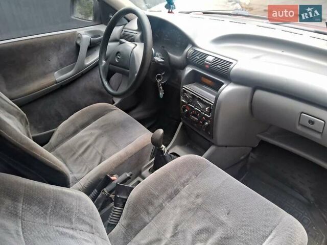 Червоний Опель Астра, об'ємом двигуна 1.39 л та пробігом 300 тис. км за 1700 $, фото 6 на Automoto.ua