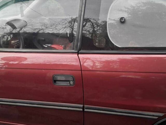 Красный Опель Астра, объемом двигателя 1.4 л и пробегом 330 тыс. км за 1304 $, фото 5 на Automoto.ua