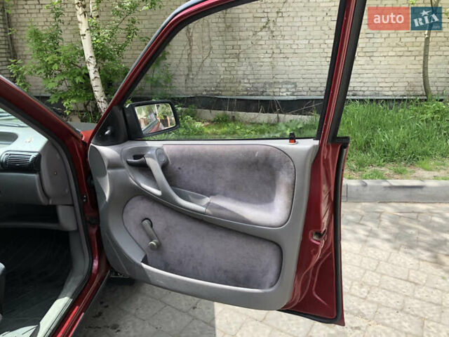 Красный Опель Астра, объемом двигателя 1.6 л и пробегом 332 тыс. км за 2100 $, фото 26 на Automoto.ua