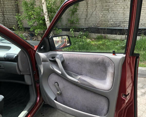 Красный Опель Астра, объемом двигателя 1.6 л и пробегом 332 тыс. км за 2100 $, фото 25 на Automoto.ua