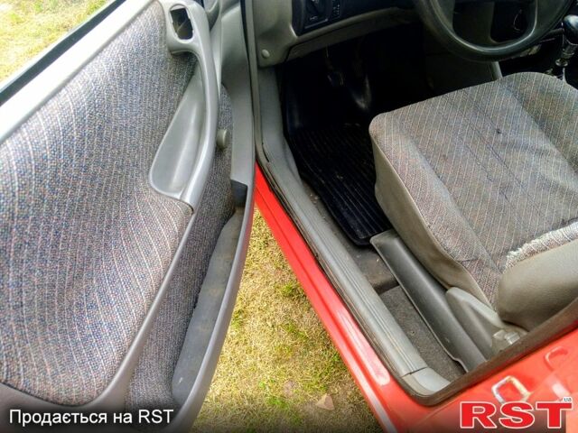 Красный Опель Астра, объемом двигателя 1.4 л и пробегом 223 тыс. км за 1300 $, фото 5 на Automoto.ua