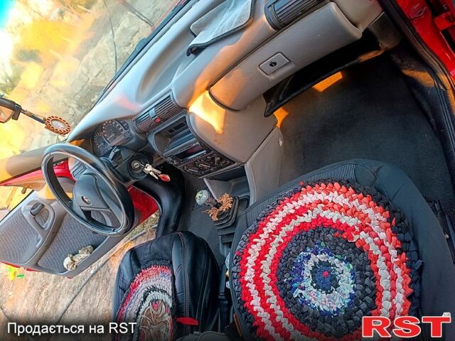 Красный Опель Астра, объемом двигателя 1.6 л и пробегом 215 тыс. км за 2000 $, фото 5 на Automoto.ua