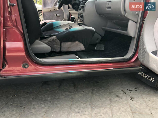 Красный Опель Астра, объемом двигателя 1.6 л и пробегом 332 тыс. км за 2100 $, фото 28 на Automoto.ua