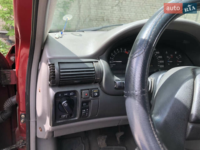 Красный Опель Астра, объемом двигателя 1.6 л и пробегом 332 тыс. км за 2100 $, фото 42 на Automoto.ua