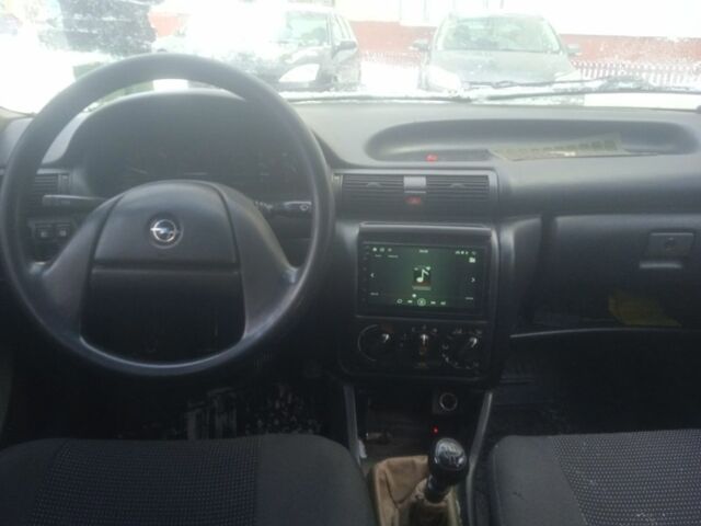 Червоний Опель Астра, об'ємом двигуна 1.6 л та пробігом 300 тис. км за 1350 $, фото 1 на Automoto.ua