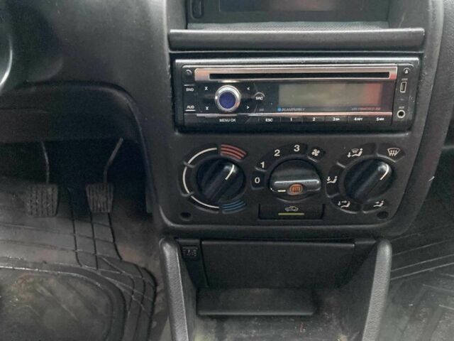 Красный Опель Астра, объемом двигателя 1.6 л и пробегом 256 тыс. км за 1200 $, фото 5 на Automoto.ua