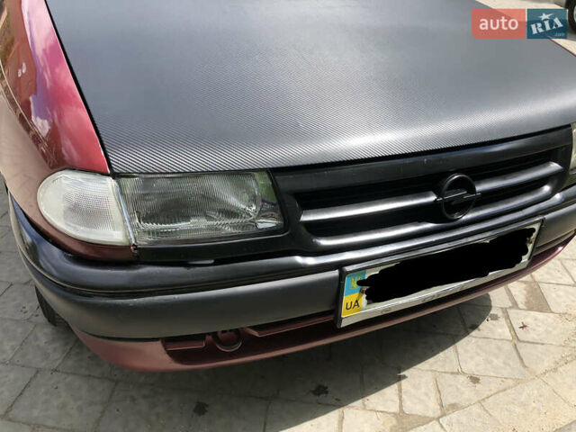 Красный Опель Астра, объемом двигателя 1.6 л и пробегом 332 тыс. км за 2100 $, фото 6 на Automoto.ua