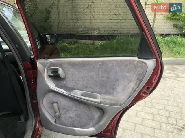 Красный Опель Астра, объемом двигателя 1.6 л и пробегом 332 тыс. км за 2100 $, фото 29 на Automoto.ua