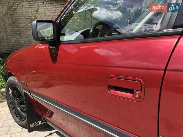 Красный Опель Астра, объемом двигателя 1.6 л и пробегом 332 тыс. км за 2100 $, фото 12 на Automoto.ua
