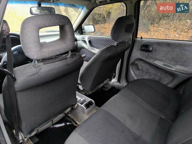 Красный Опель Астра, объемом двигателя 1.8 л и пробегом 200 тыс. км за 905 $, фото 3 на Automoto.ua