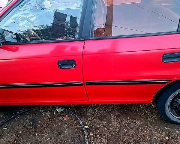 Красный Опель Астра, объемом двигателя 1.6 л и пробегом 215 тыс. км за 2000 $, фото 7 на Automoto.ua