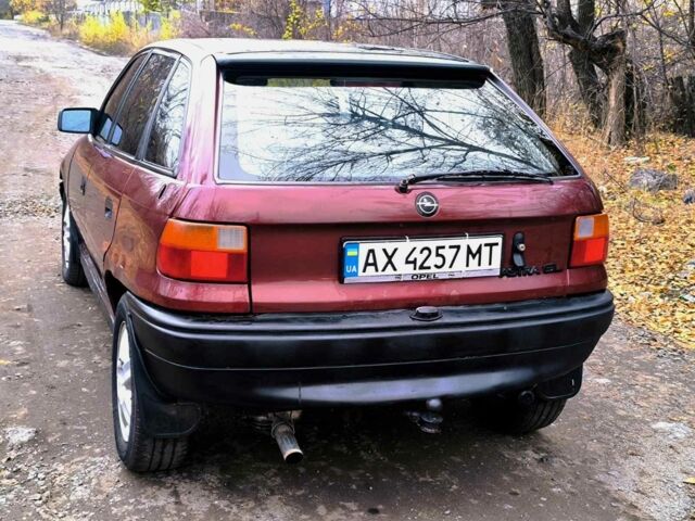 Красный Опель Астра, объемом двигателя 1.8 л и пробегом 200 тыс. км за 905 $, фото 7 на Automoto.ua