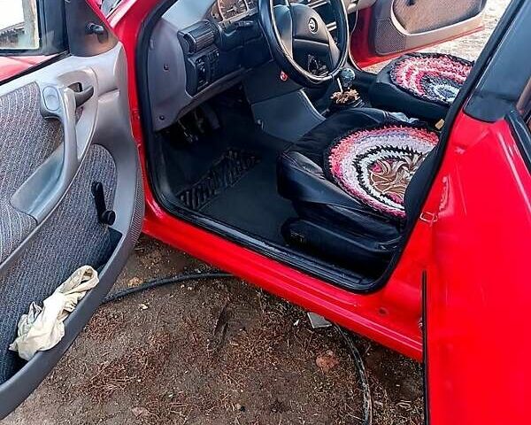 Красный Опель Астра, объемом двигателя 1.6 л и пробегом 215 тыс. км за 2000 $, фото 1 на Automoto.ua