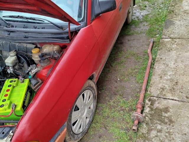 Красный Опель Астра, объемом двигателя 1.4 л и пробегом 40 тыс. км за 600 $, фото 7 на Automoto.ua